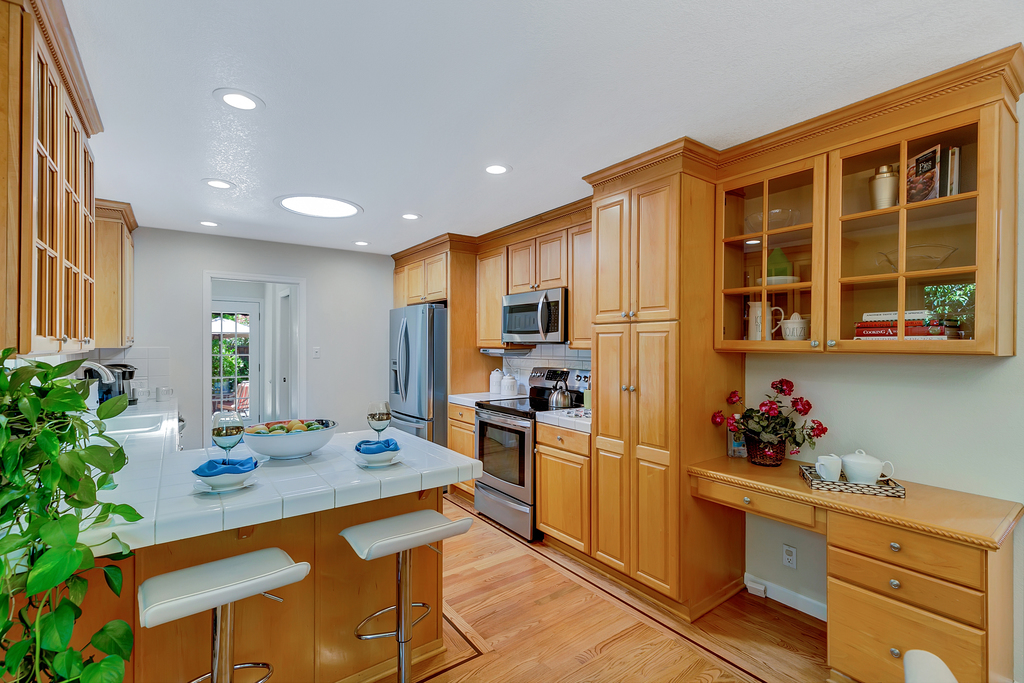 Kitchen with cherry wood cabinets